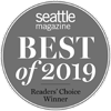 A circular badge reading "Seattle Magazine Best of 2019 Readers' Choice Winner" in white letters on a gray background.